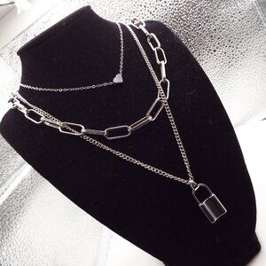 UP TO DATE THREE SILVERY NECKLACES W/ LOCK, HEART AND PAPERCLIP LINKS 25